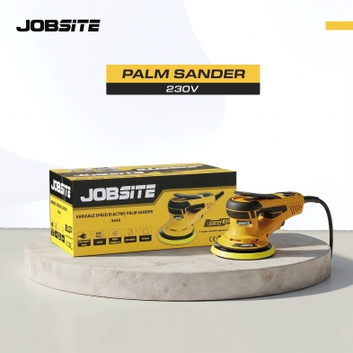 Caja de lijadora Jobsite 230V con la herramienta en exposición sobre mesa de trabajo.