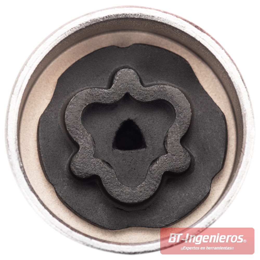 Primer plano de una llave extractora para tornillos antirrobo Opel, muestra el patrón de seguridad interno para ruedas.