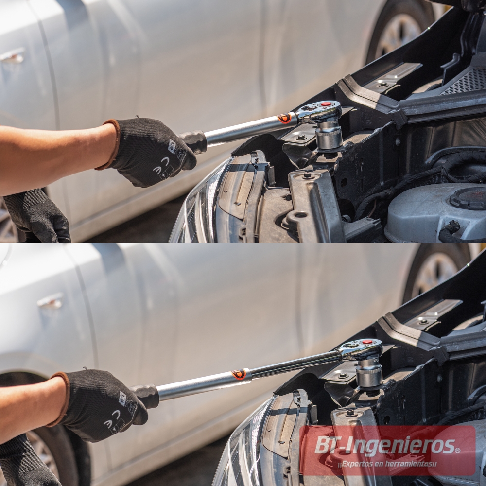 Detalle de uso real de la carraca telescópica en taller mecánico