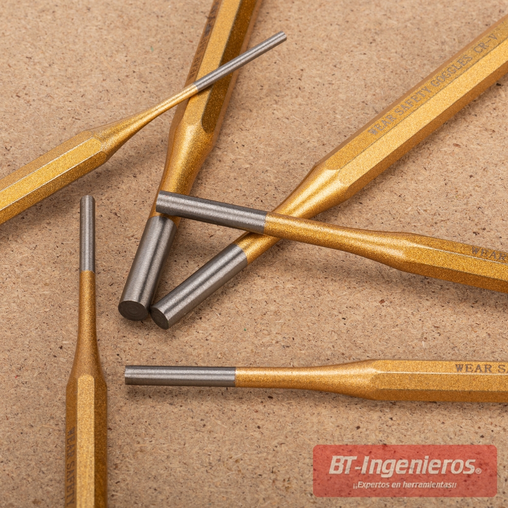 Juego de punzones CR-V en uso sobre superficie de trabajo