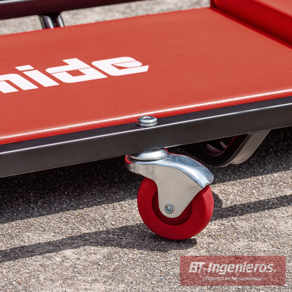 Camilla de mecánico Piramide con ruedas giratorias y chasis de acero negro.