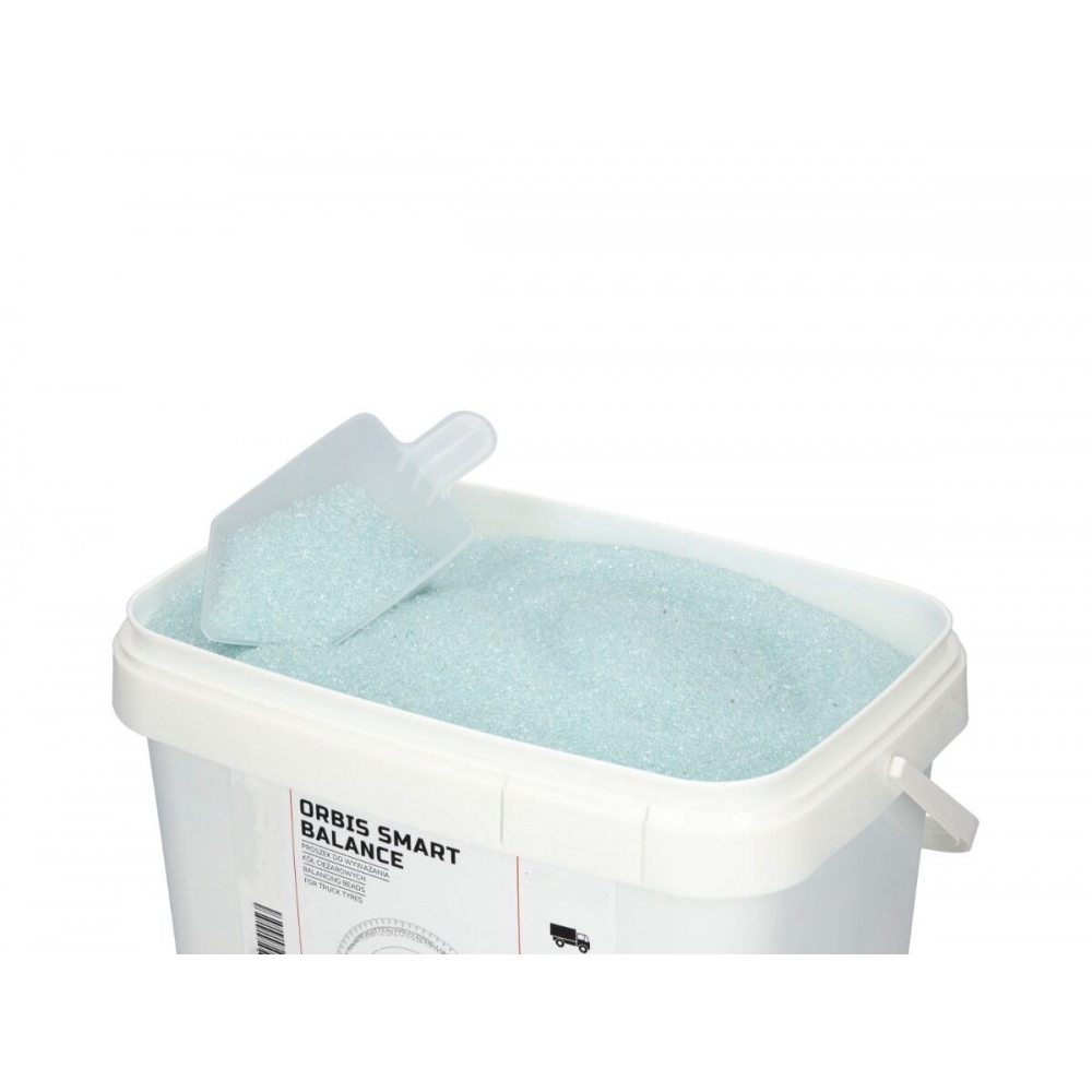 Detalle del granulado de equilibrado interior Orbis Smart Balance para ruedas de camión.